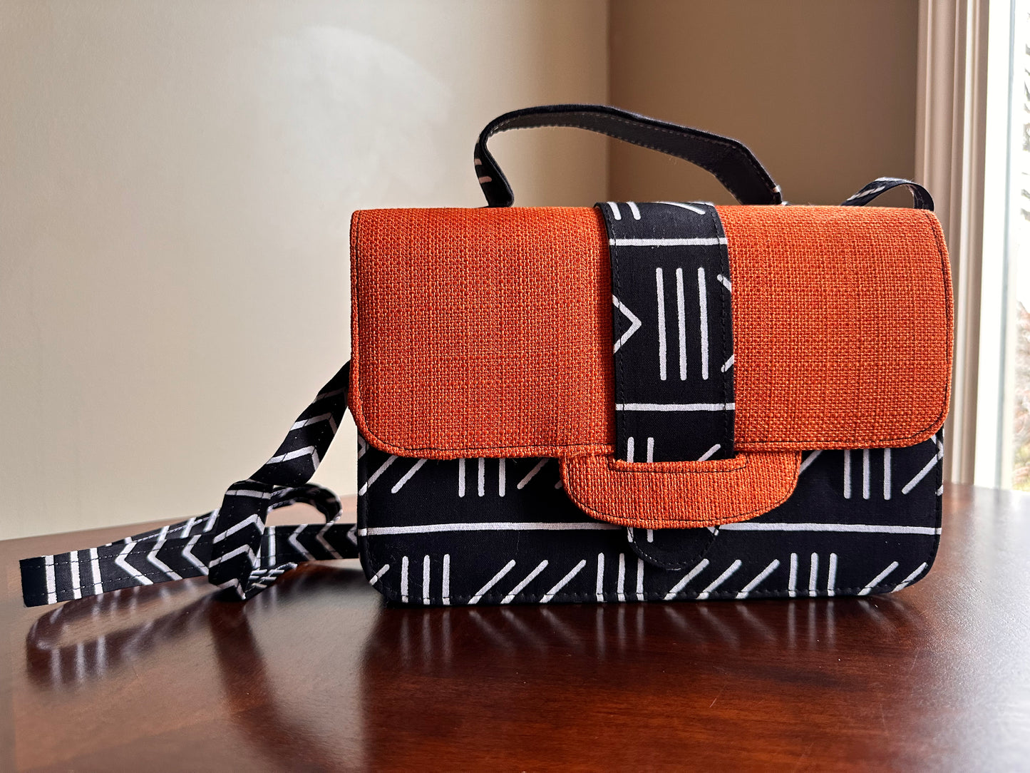 Black and white kente satchel